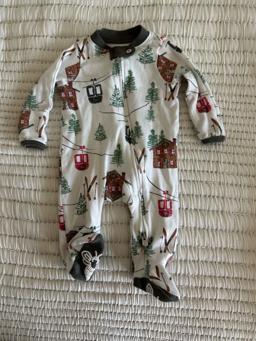 Burt's Bees White Footed One-Piece with Red Cabin & Green Tree Print